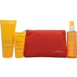 Clarins Sun Protection Essentials Confezione Regalo 75ml Crema Solare Anti Rughe UVB30 + 150ml Olio Solare Protettivo Spray UVB30 + 200ml Crema Ultra Idratante Doposole + Borsa Da Viaggio